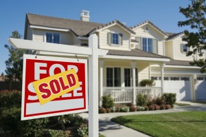 Sold Home For Sale Sign in Front of New House